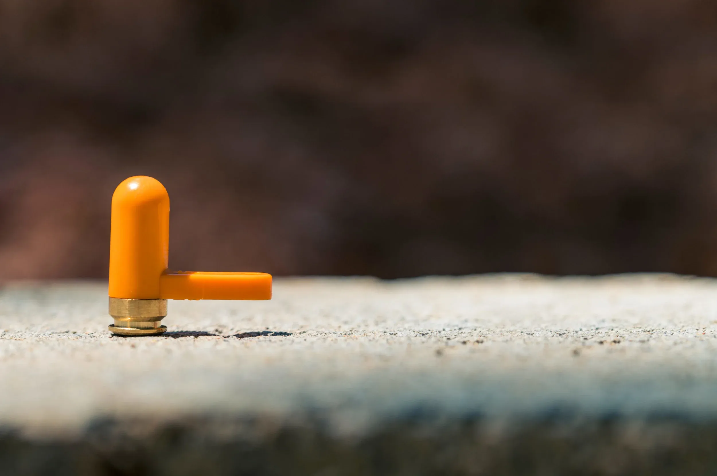 Orange flag visible in the ejection port